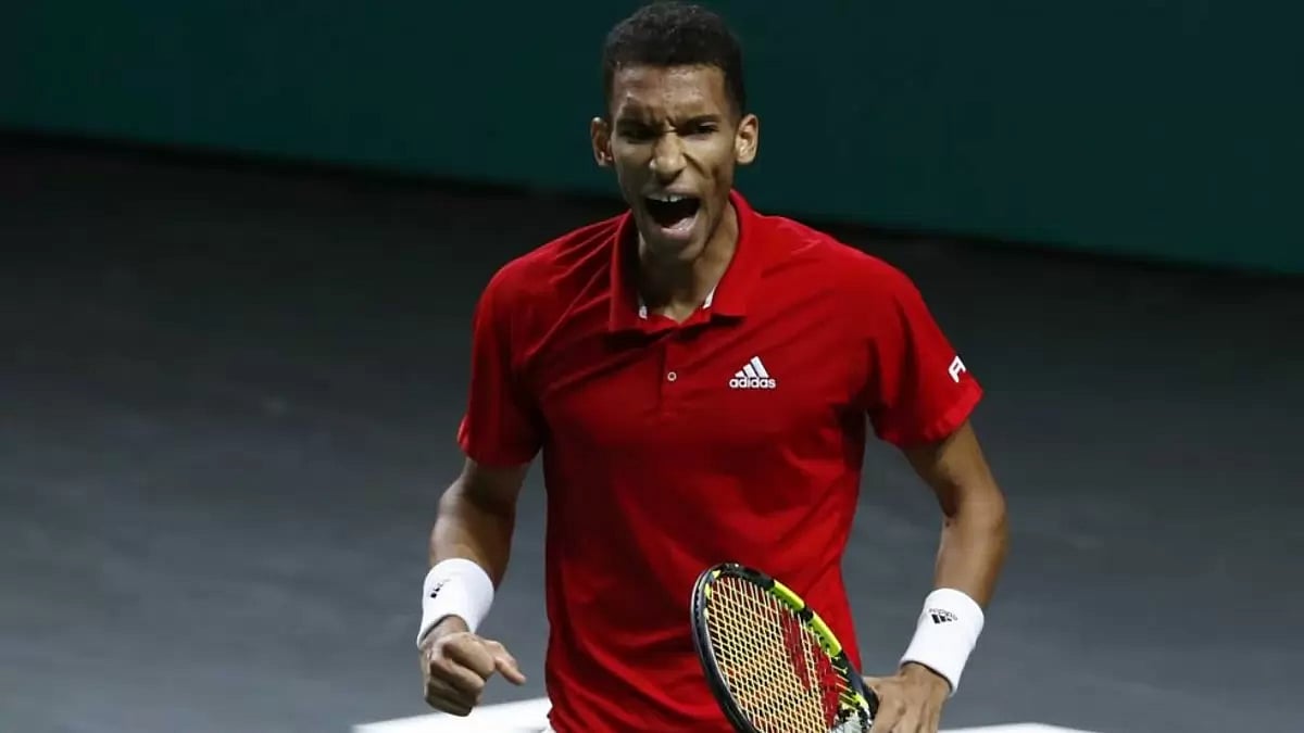 Felix Auger-Aliassime secured the winning point when he downed Alex de Minaur 6-3, 6-4.
