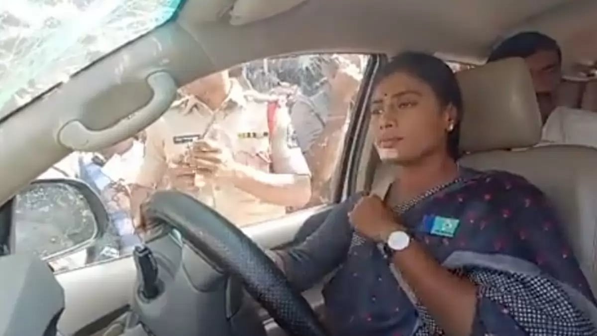SR Telangana party chief YS Sharmila inside her car in Hyderabad while it was being towed