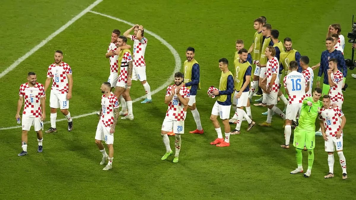 Croatia players celebrate after their team's win against Canada.