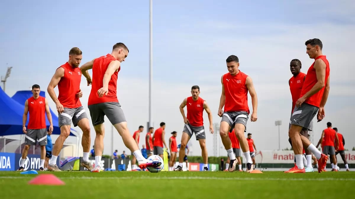 Swiss players train ahead of their final group stage match against Serbia.