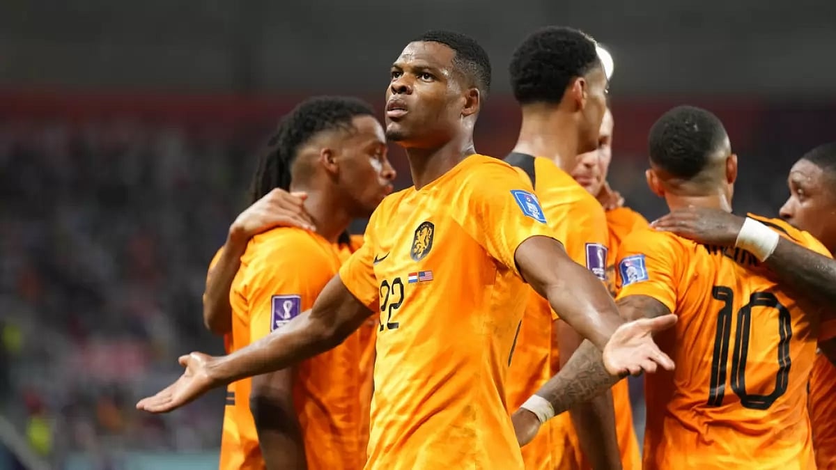 Netherlands' Denzel Dumfries celebrates after scoring his team's third goal against USA.