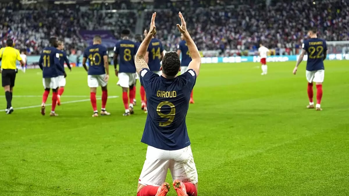 Olivier Giroud celebrates his record-breaking goal against Poland on Sunday.