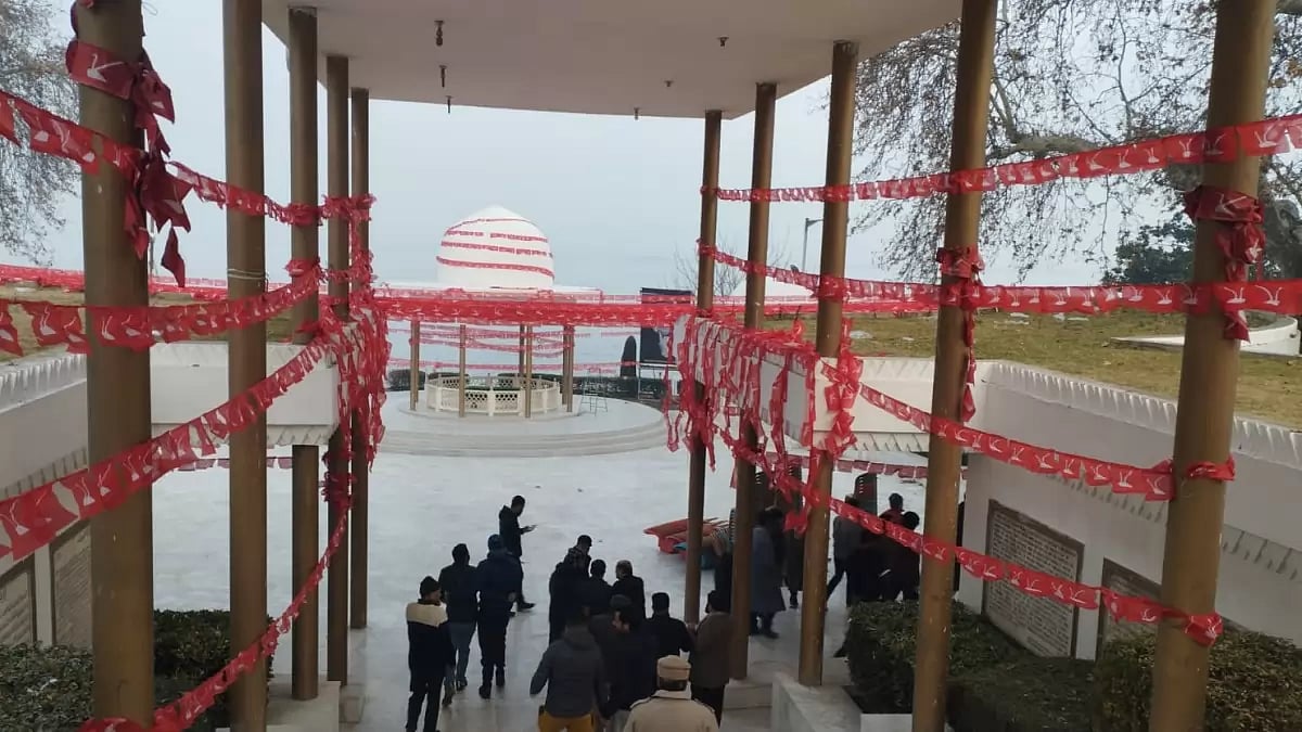 NC workers at Sheikh Mohammad Abdullah's mausoleum at Hazratbal on Sunday