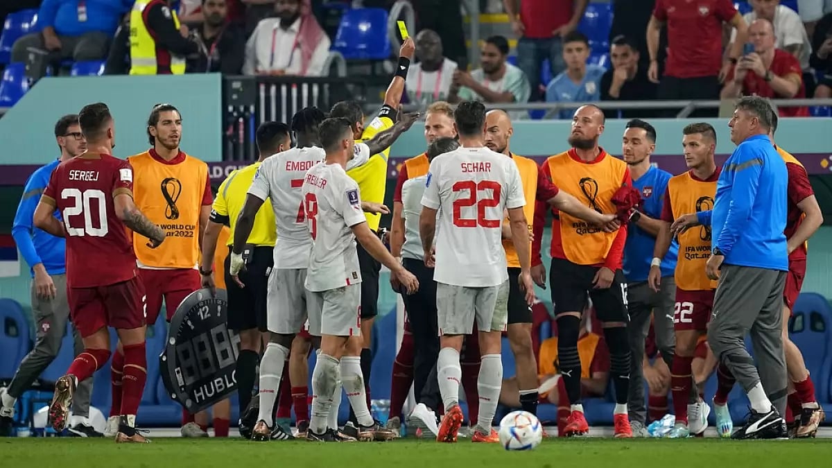 Serbia players from the bench seen arguing with Switzerland players during their match on Friday.
