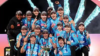 WBBL team Adelaide Strikers celebrate after winning the 2022 championship.