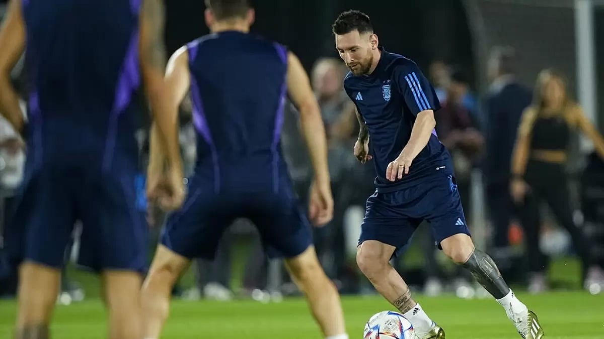 Messi, right, dribbles during Argentina's team training session on Thursday.