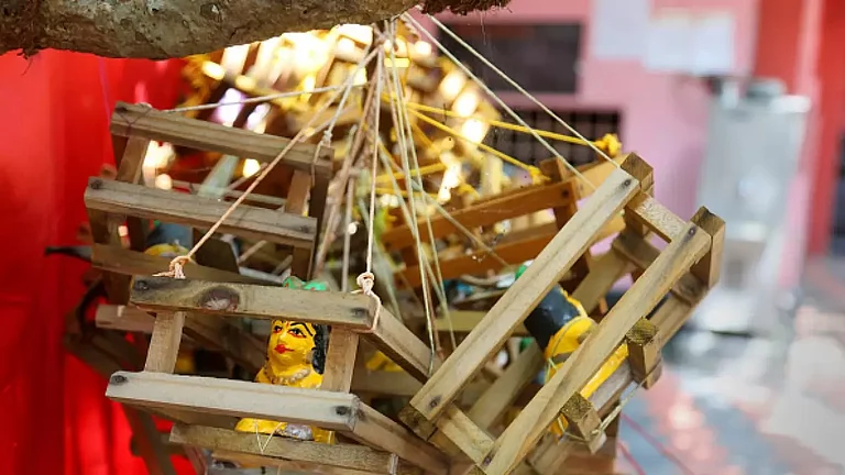Small wooden cradles placed by Hindu families praying to have children. - null