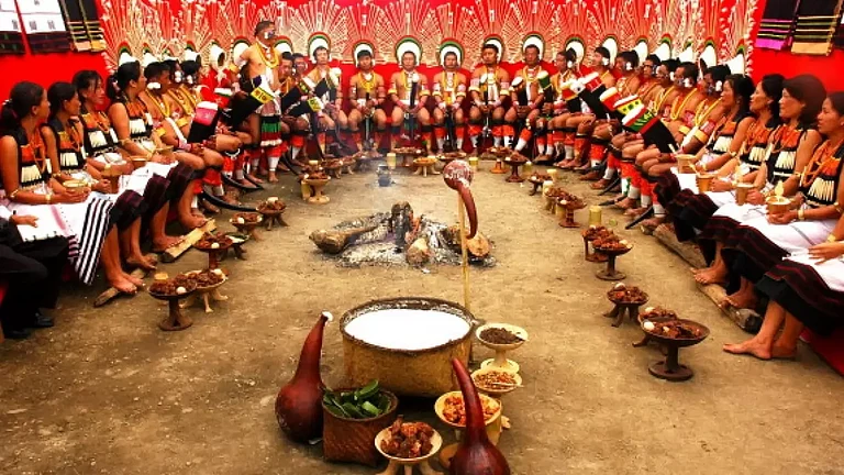 People from Angami community feasting on the Hornbill Festival at Nagaland's Kisama village - null