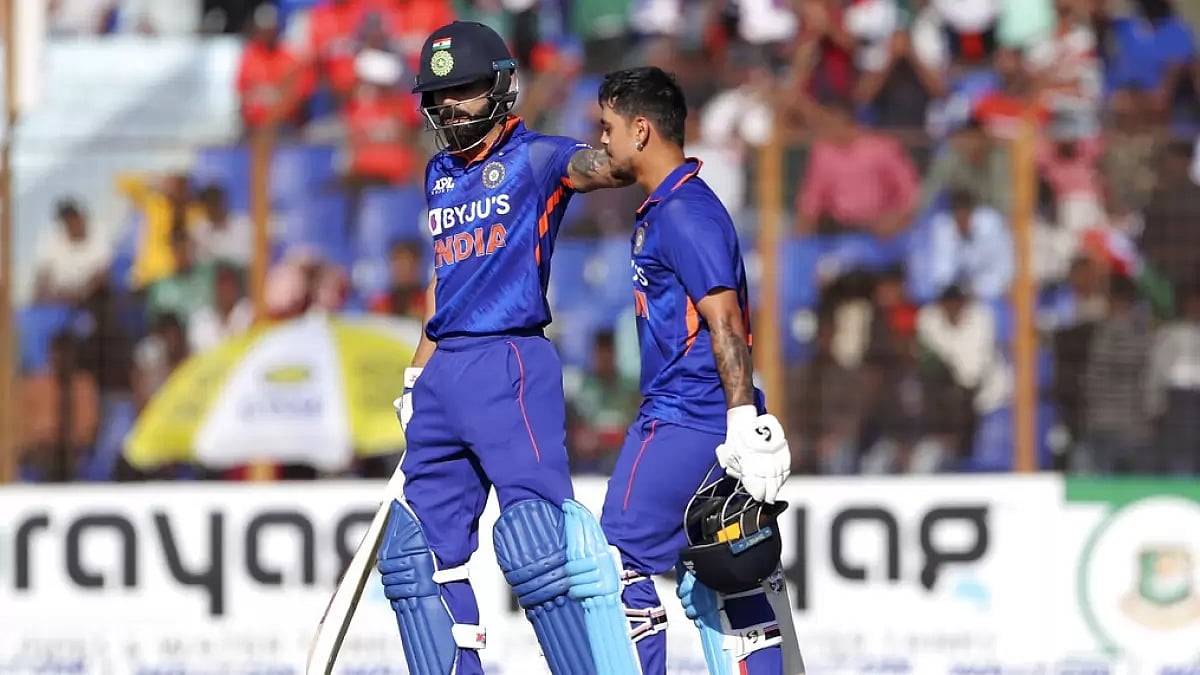 Kohli, left, congratulates Ishan Kishan after his 200.