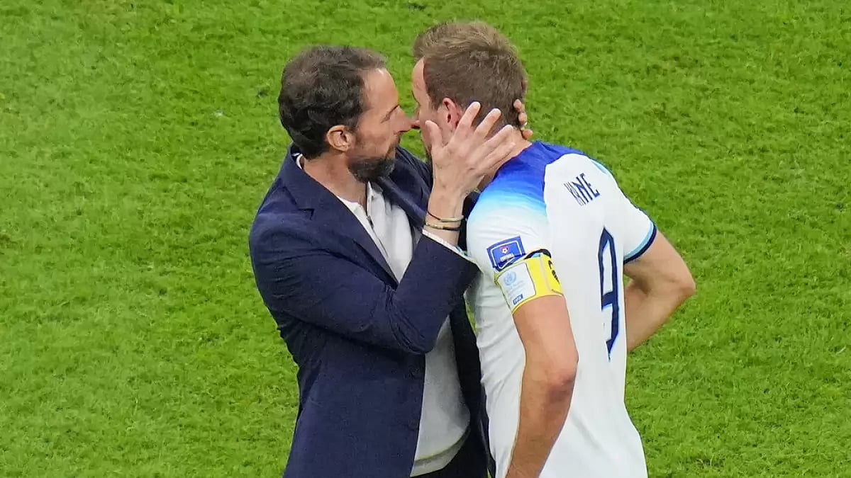 Gareth Southgate, left, consoles Harry Kane after England's loss to France on Saturday.