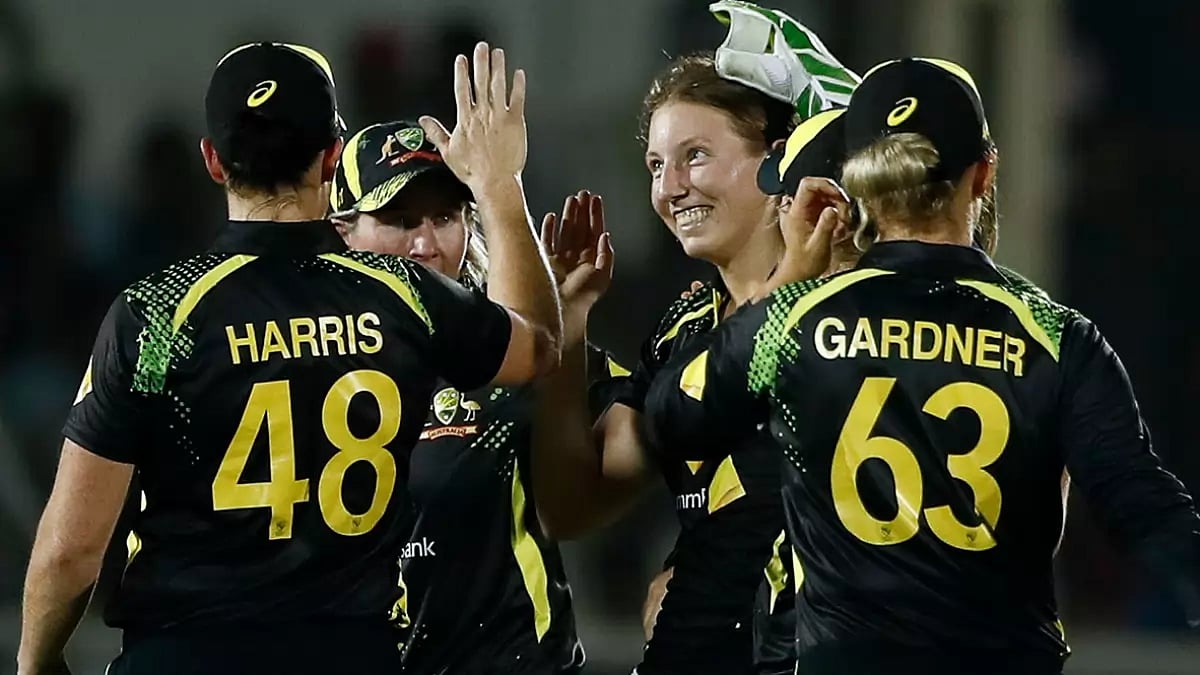 Australia's Darcie Brown celebrates a wicket with her teammates.