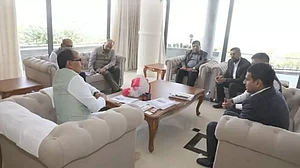 Madhya Pradesh CM Shivraj Singh Chouhan with the officials of Volvo Group and Eicher Motors