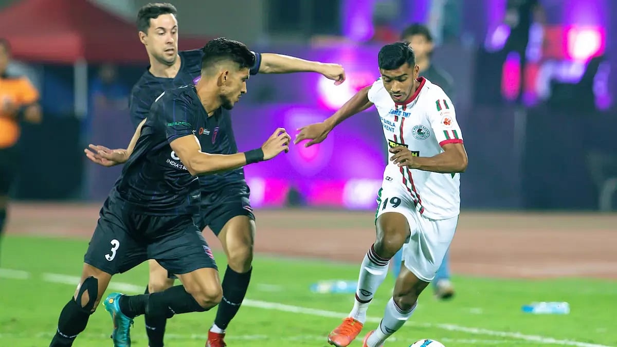 ATKMB's Ashique Khuriniyan dribbles the ball past OFC players in a goalless draw on Thursday.