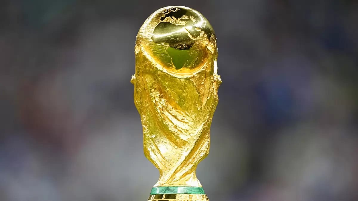 The trophy is displayed on the pitch ahead of the World Cup final between Argentina and France.