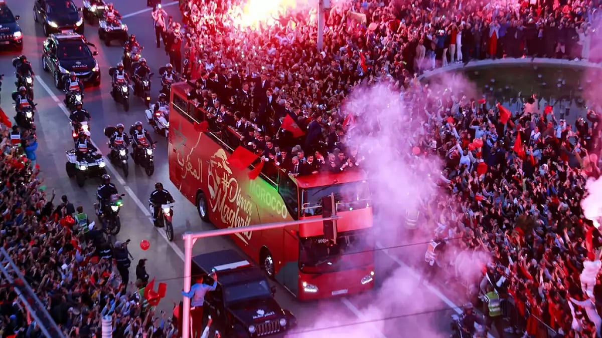 Fans in Rabat celebrate the homecoming of Morocco national football team on Tuesday.
