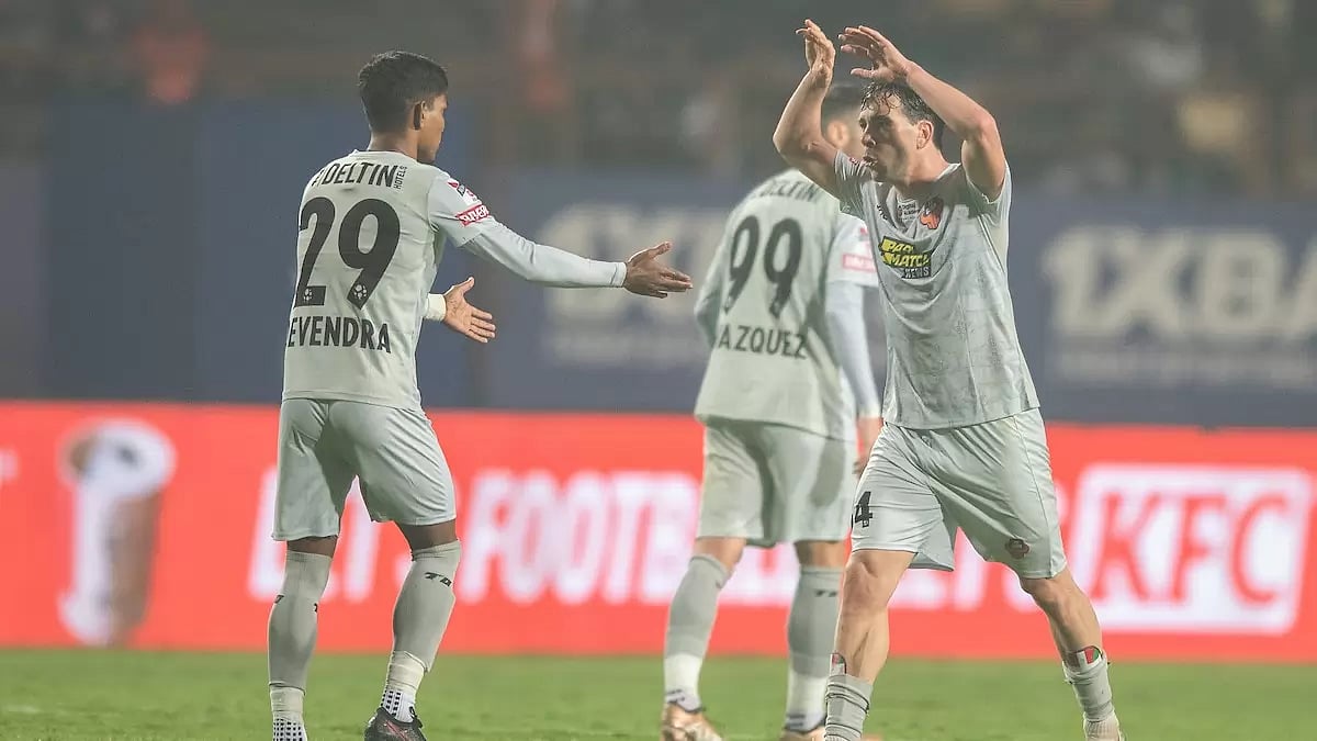 Iker Guarrotxena celebrates with Devendra after scoring the equaliser against Jamshedpur.