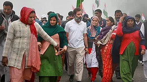 Congress leader Rahul Gandhi with supporters during the party's Bharat Jodo Yatra in Haryana
