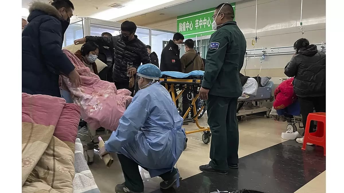 A sickened patient is moved onto a gurney at the emergency department of the Langfang No. 4 Peoples Hospital in Bazhou city in northern Chinas Hebei province.