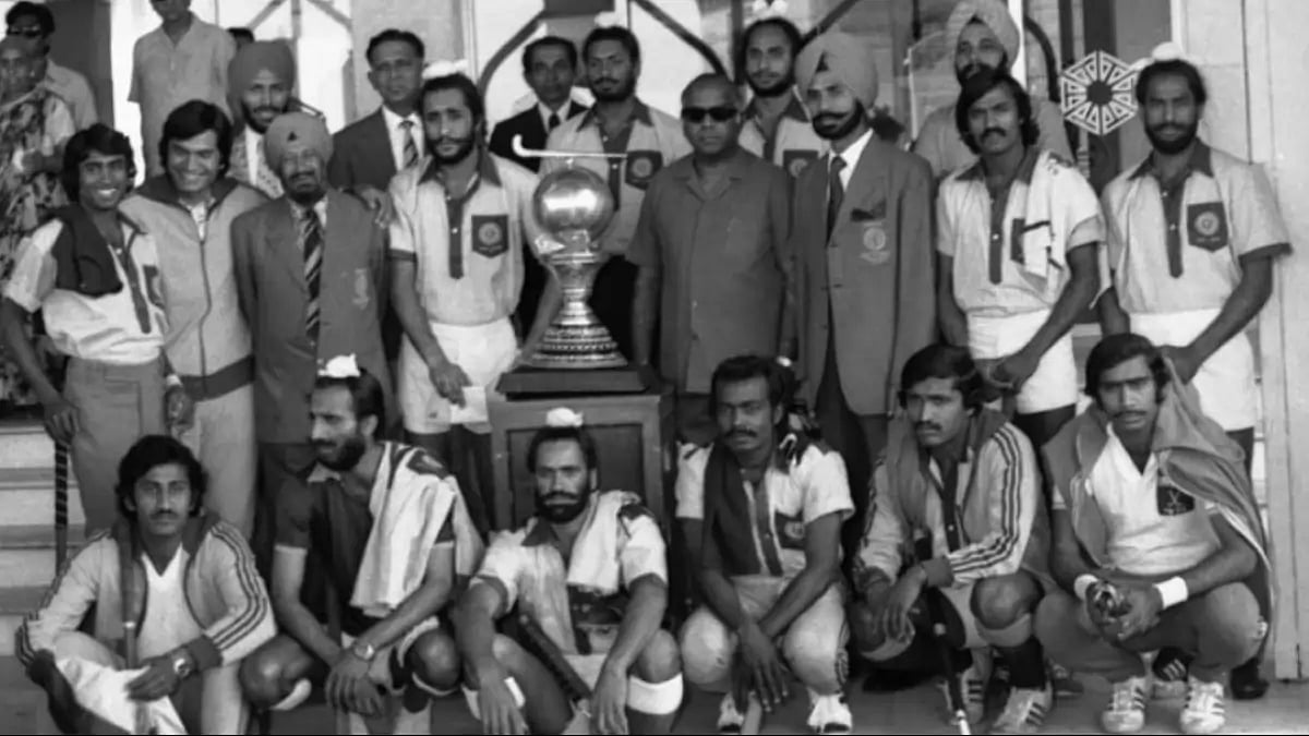 India's 1975 national hockey team poses with the World Cup.