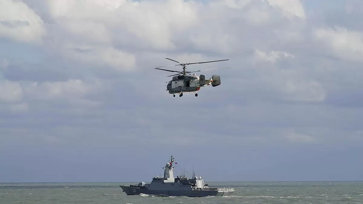 Representative image: Russian naval frigate and a helicopter