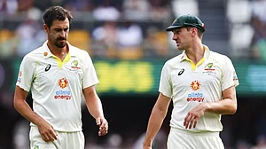 Mitchell Starc (left) with Pat Cummins (right)