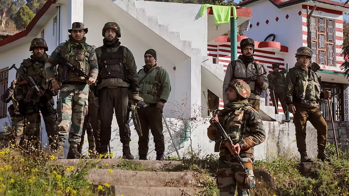 Indian Army personnel near the IED blast site in Rajouris Upper Dangri village