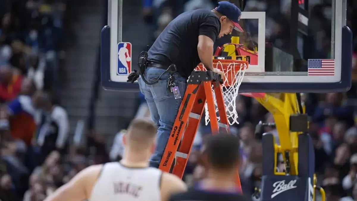 Denver Nuggets coach Michael Malone called the situation “a buzzkill.”