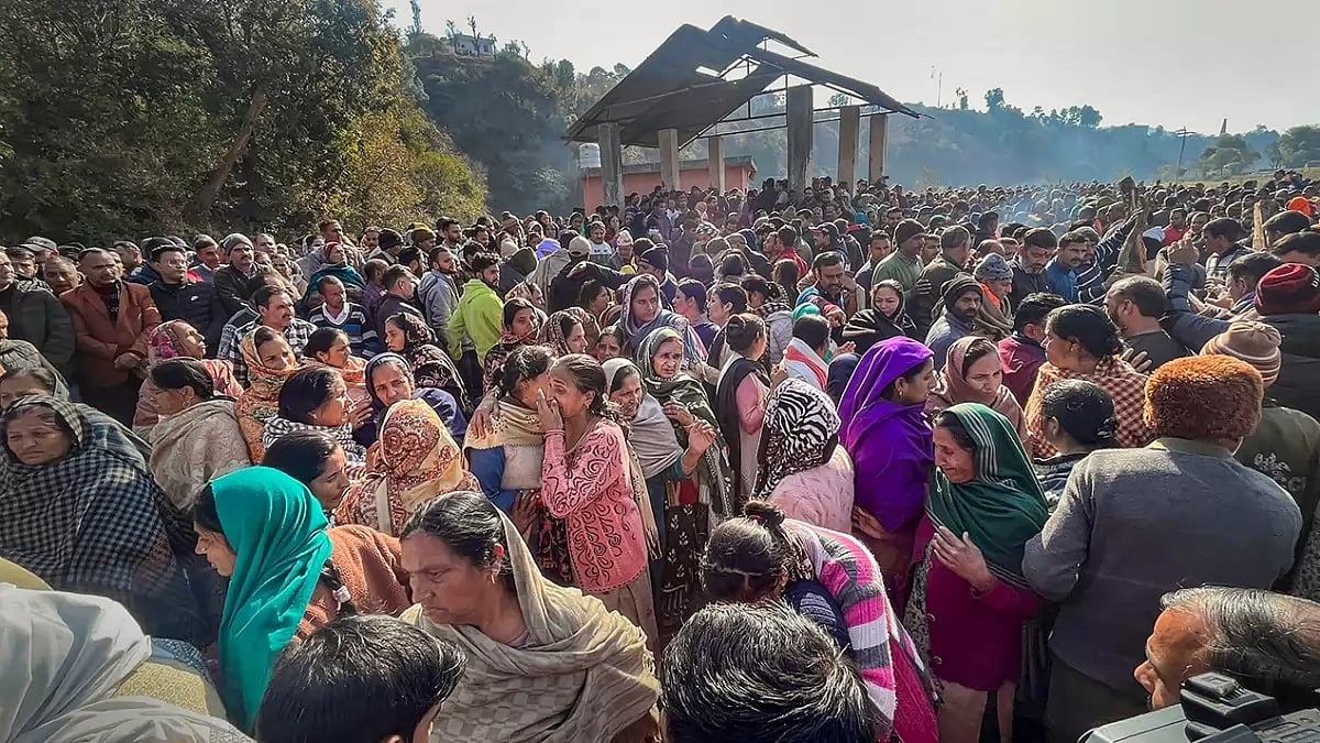 Family members and villagers during cremation of civilians killed by terrorists in Dangri village of Rajouri.