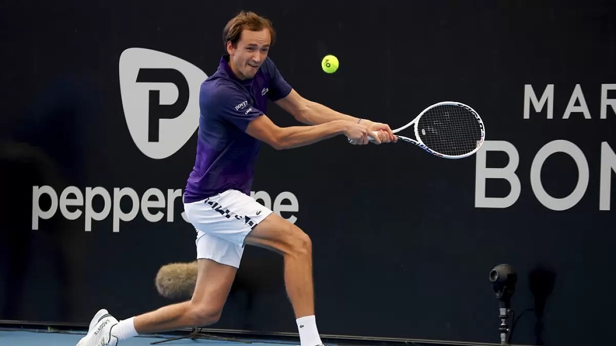 Medvedev returns a backhand against Khachanov on Friday in Adelaide.