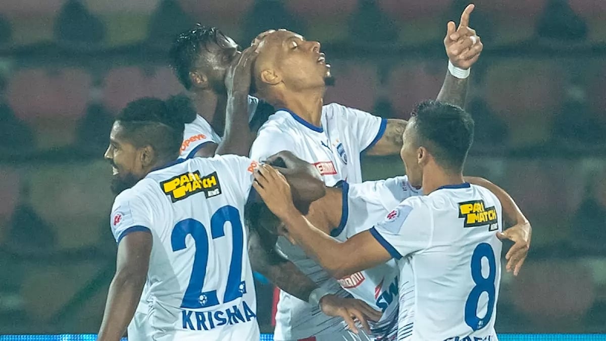 Alan Costa, centre, celebrates after scoring a late goal against NEUFC on Friday.