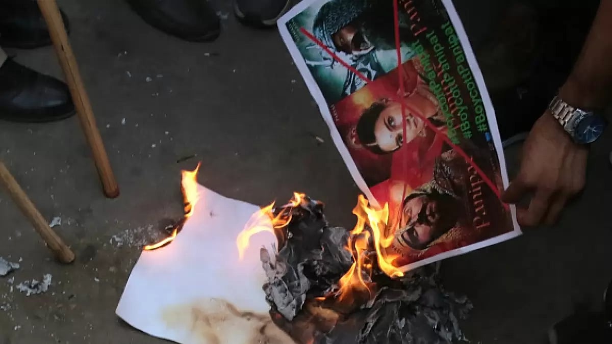 A poster of film Panipat being burnt by the protestors