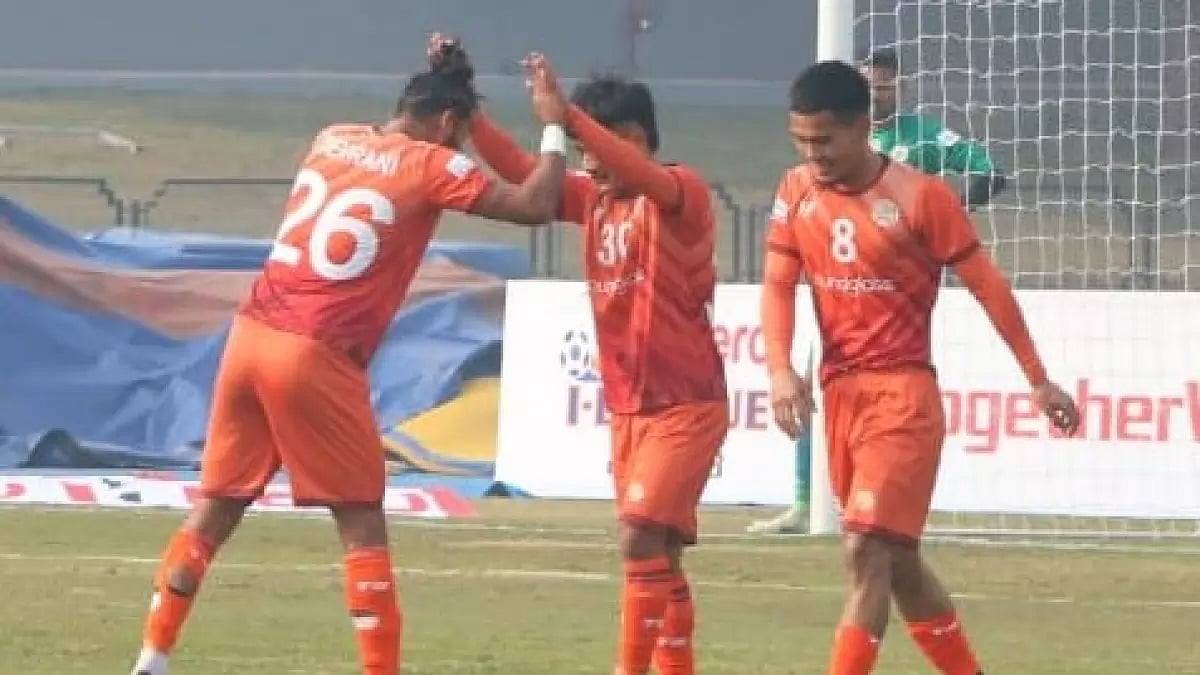 Brandon Vanlalremdika, centre, celebrates after scoring his team's second goal against NEROCA FC.