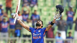 Virat Kohli celebrates after scoring his 46th ODI century on Sunday.
