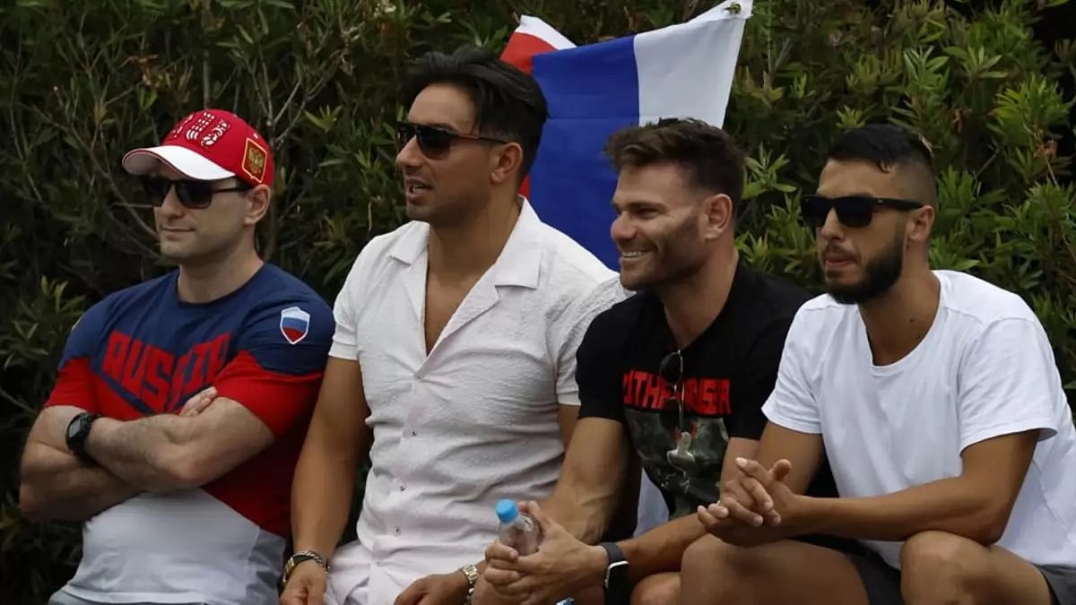 A Russian flag is seen during the first round match between Rakhimova of Russia and Baindl of Ukraine.