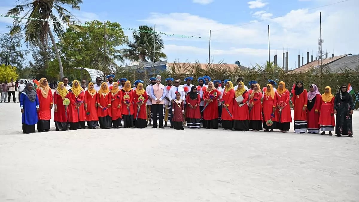S Jaishankar, centre, pictured with locals at Manadhoo.