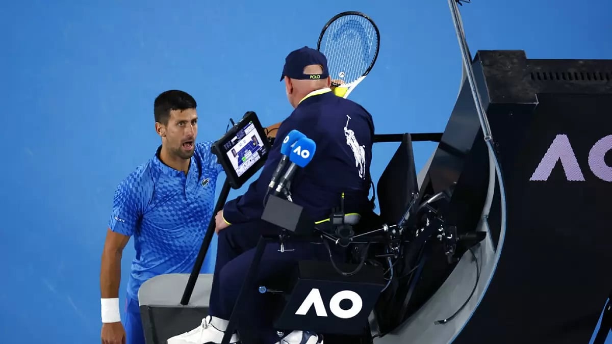 Djokovic argues with the chair umpire after being distracted by a heckler during Thursday's match.