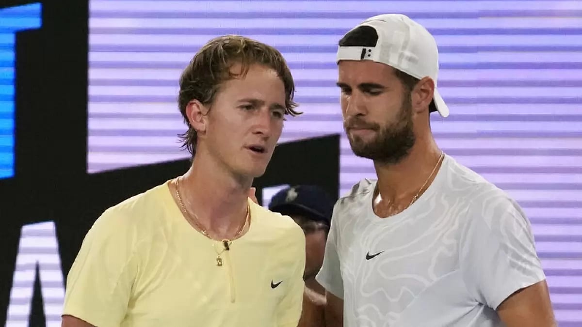 Korda (L) retired hurt during the third set of the men's singles quarter-finals vs Khachanov.
