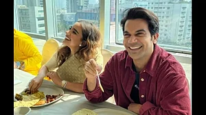 Kartik Aaryan, Rajkummar Rao Enjoy 'Bhog' At Anurag Basu's Saraswati Puja Celebration