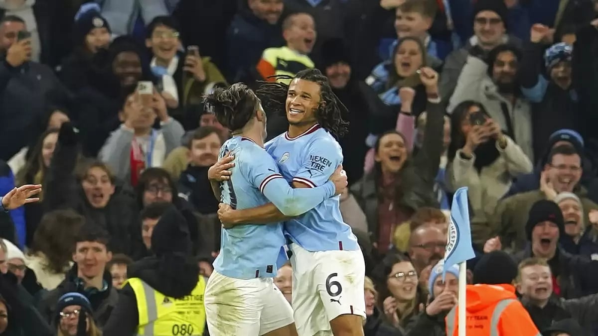 Nathan Ake, right, celebrates with Jack Grealish after scoring his team's only goal against Arsenal.