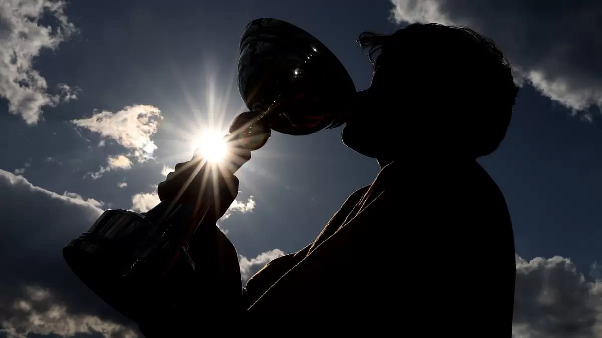 India captain Shafali Verma celebrates with the World Cup on Sunday.