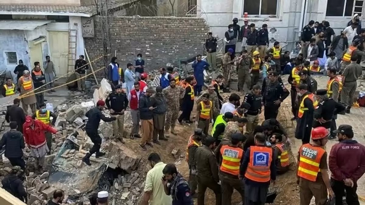 Search and rescue operations underway at the site of suicide bombing, in Peshawar, Pakistan