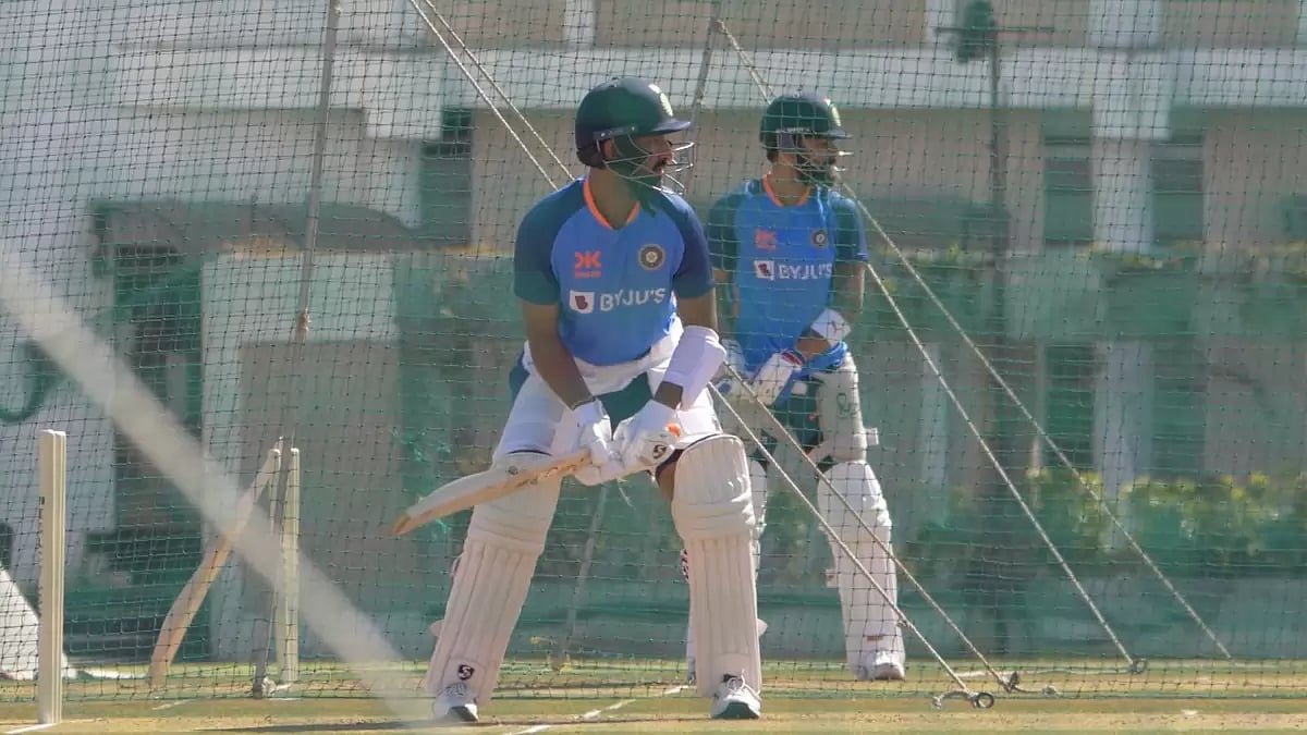 India batters Cheteshwar Pujara, front, and Virat Kohli practise in the nets on Friday.