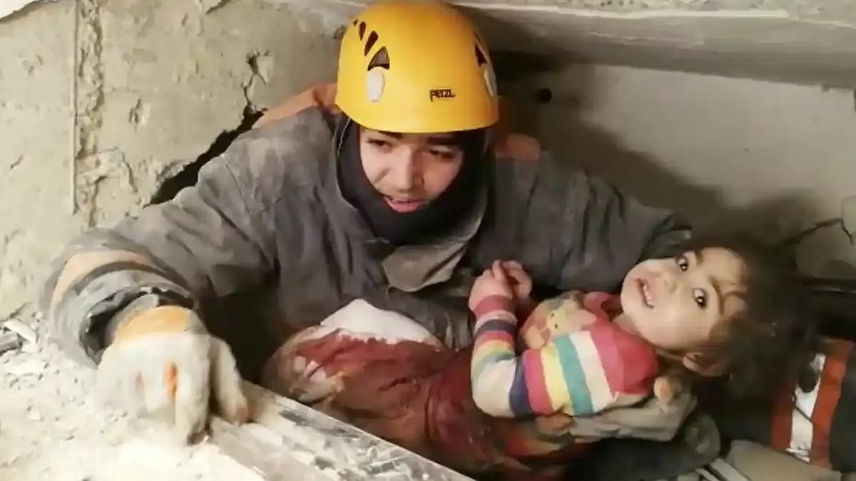 Children being rescued by the disaster management teams in earthquake-hit Turkey and Syria.