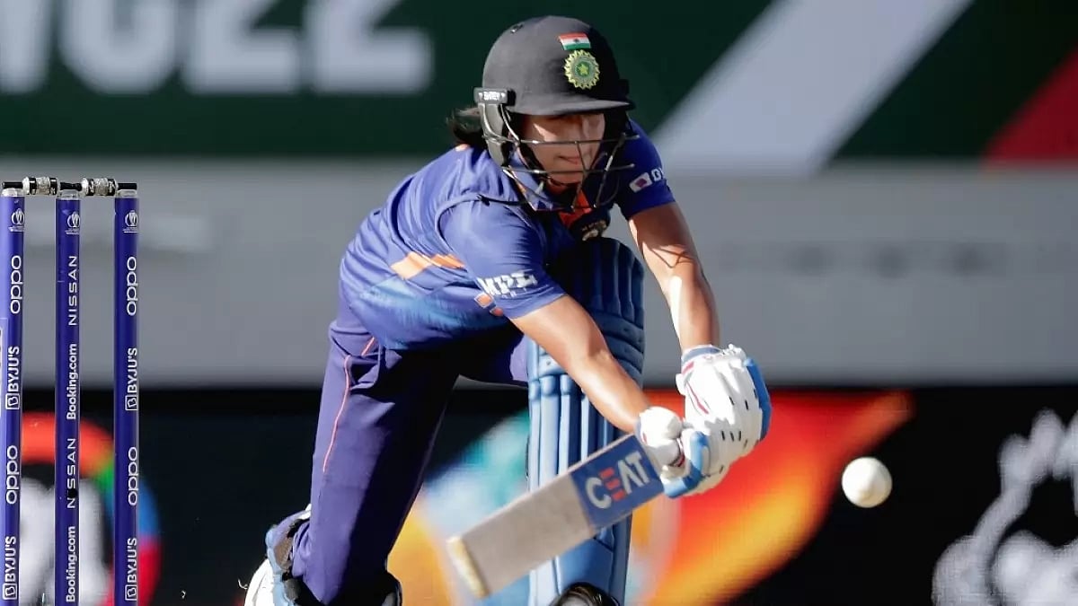 India captain Harmanpreet Kaur plays her trademark sweep shot.