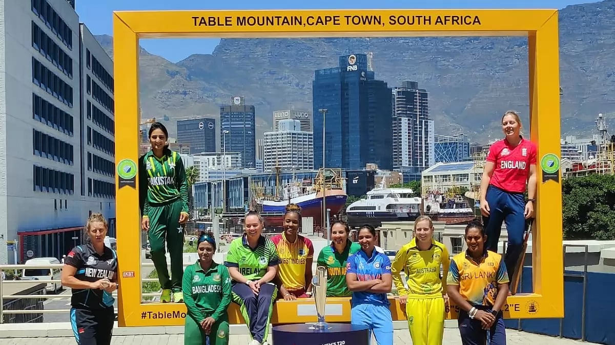 Captains of the ten participating teams pose with the ICC World Cup trophy.