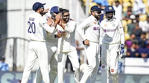Ravindra Jadeja celebrates the wicket of Peter Handscomb on Day 1 of the 1st Test on Thursday.