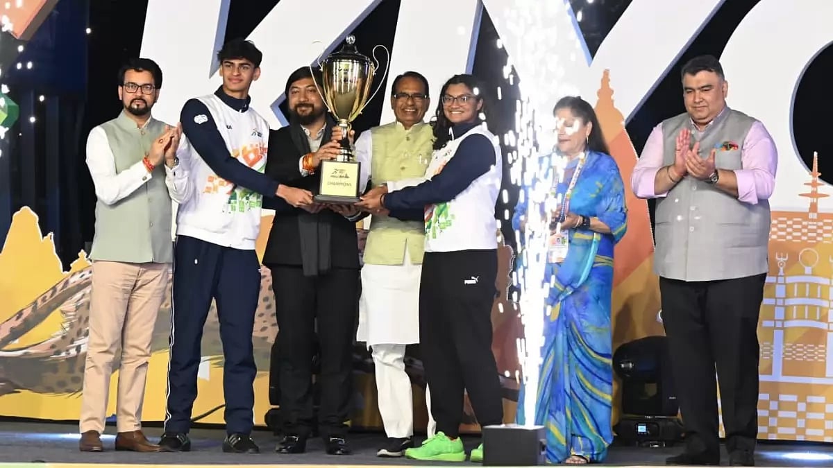 Anurag Thakur, left, attends the closing ceremony of KIYG on Saturday.