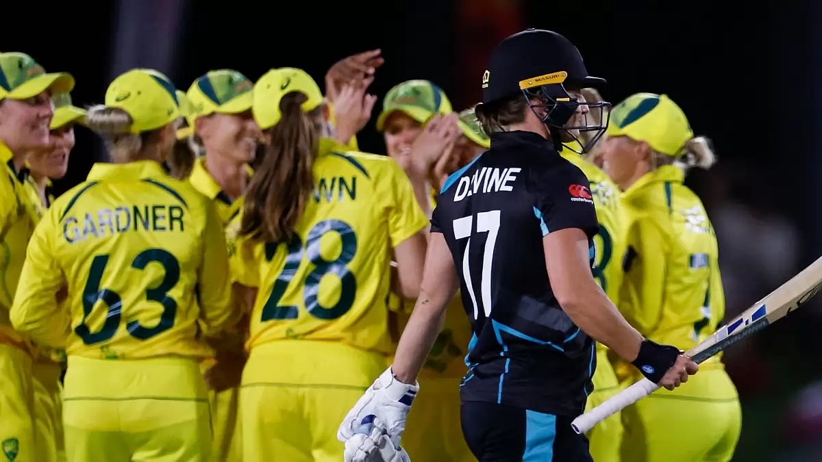 Australia players celebrate the wicket of NZ captain Sophie Devine on Saturday.