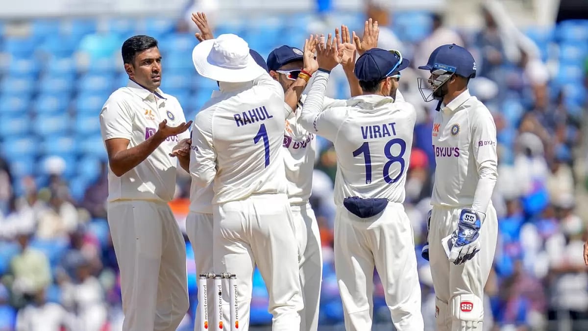 Team India players celebrate the wicket of Usman Khawaja on Day 3 of the 1st Test on Saturday.