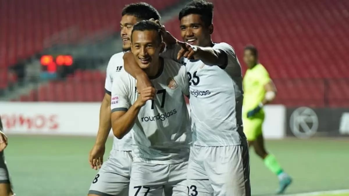 Chencho Gyeltshen, centre, celebrates with his teammates after scoring the goal against Aizawl FC.